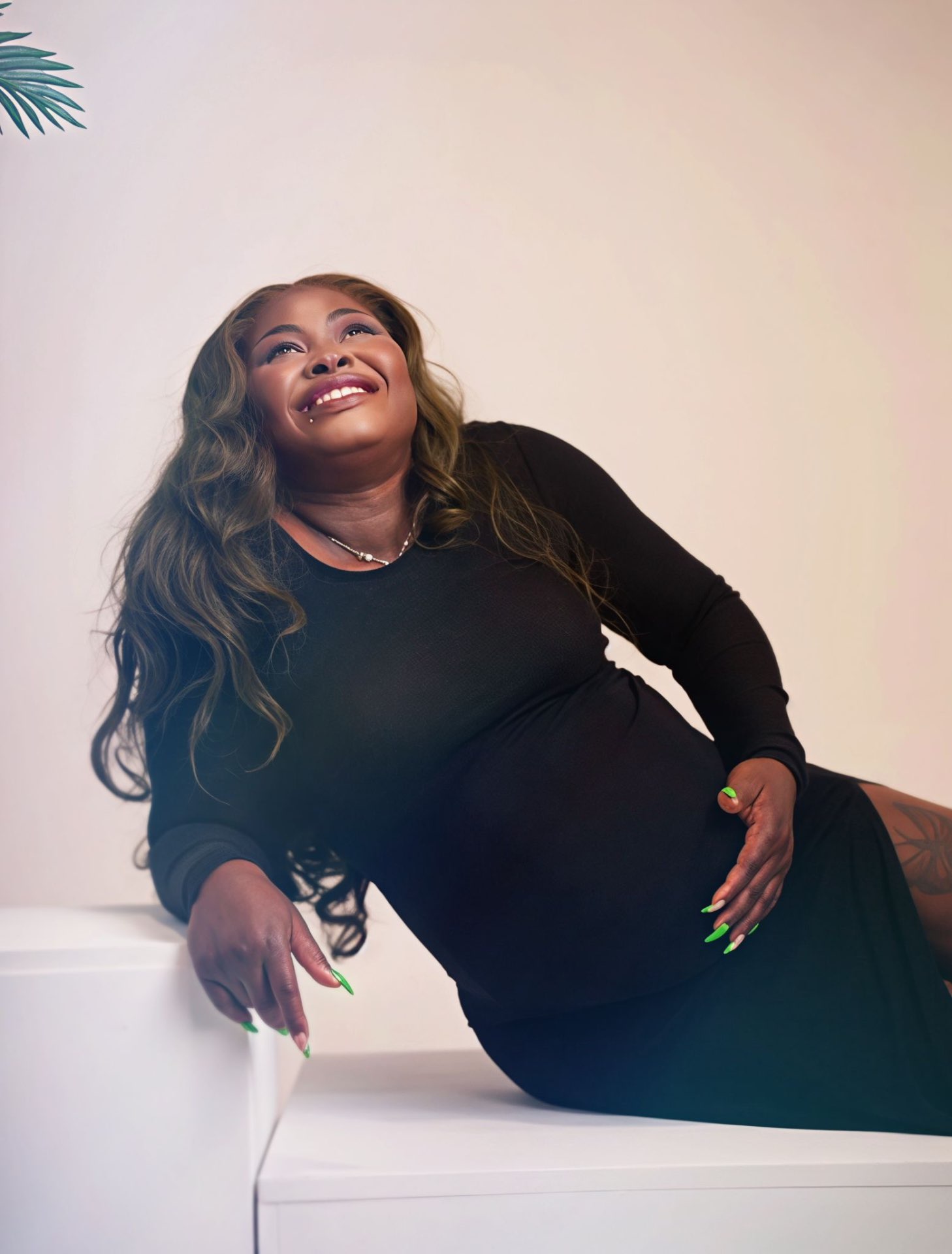 Studio portrait — joyful in black