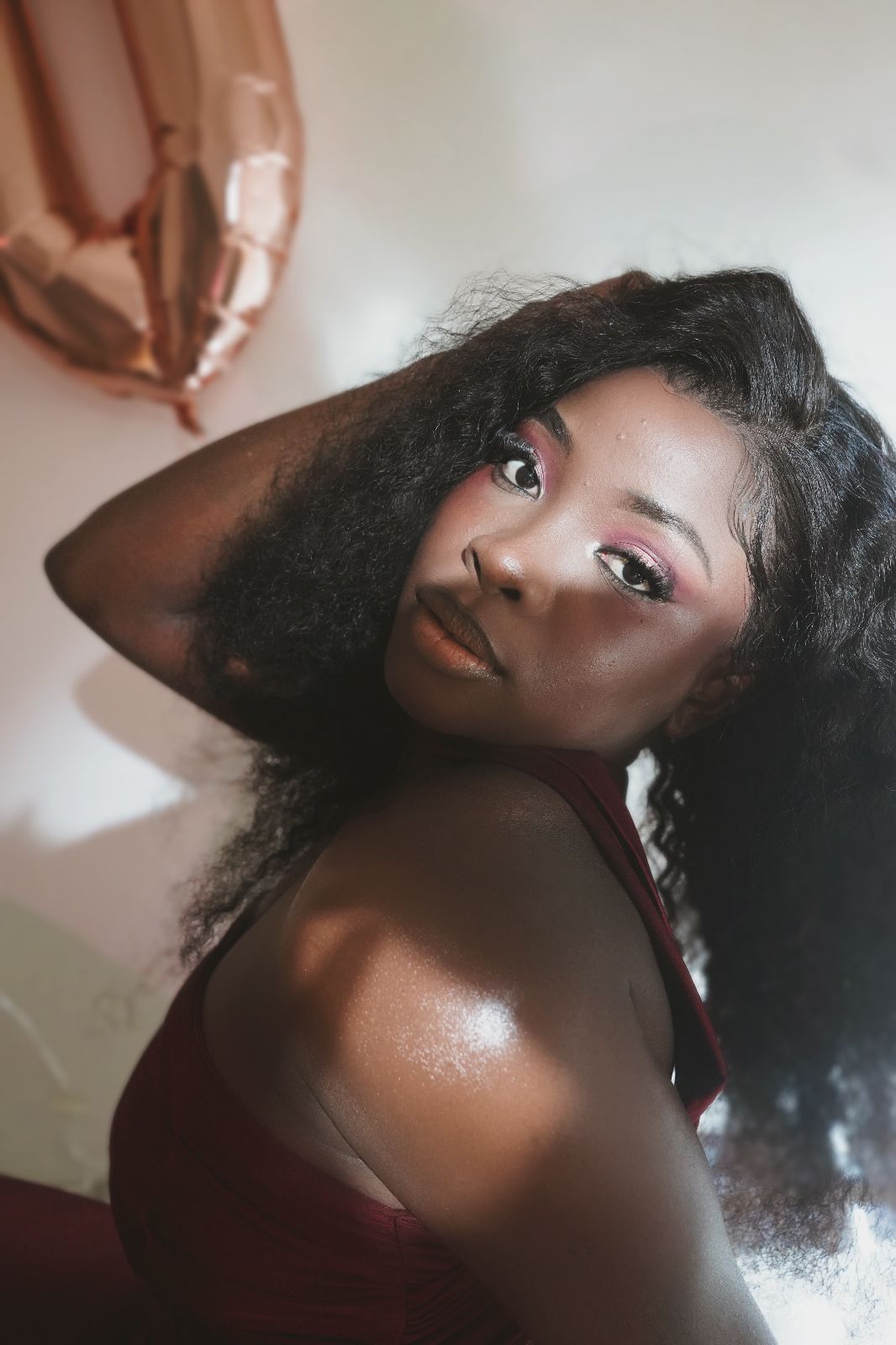 Beauty editorial — pink eye & rose-gold balloon